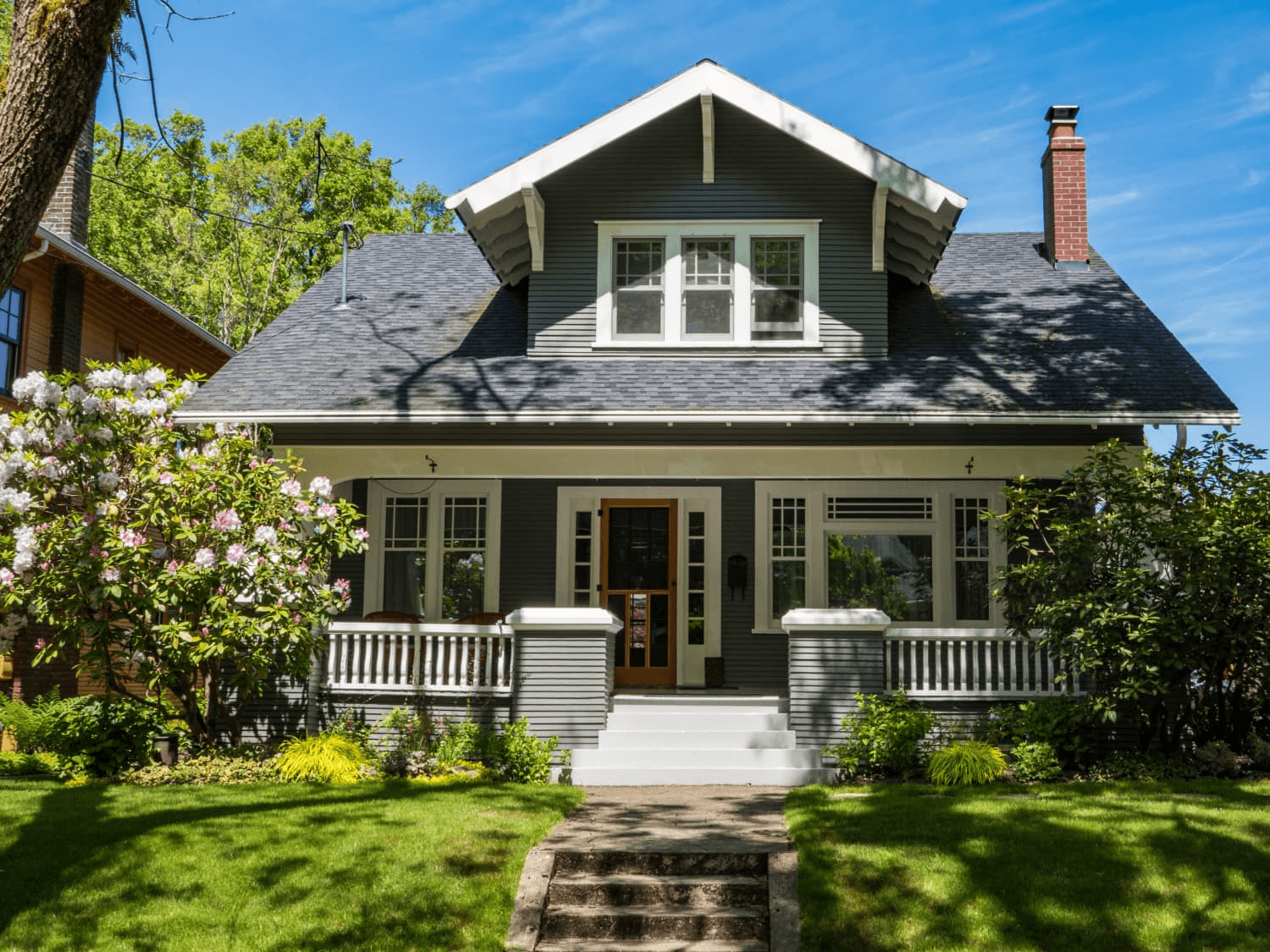 Historic Parkville home exterior with detailed trim and front porch