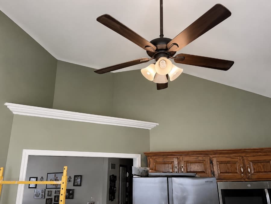 Ceiling fan installed in a finished vaulted kitchen